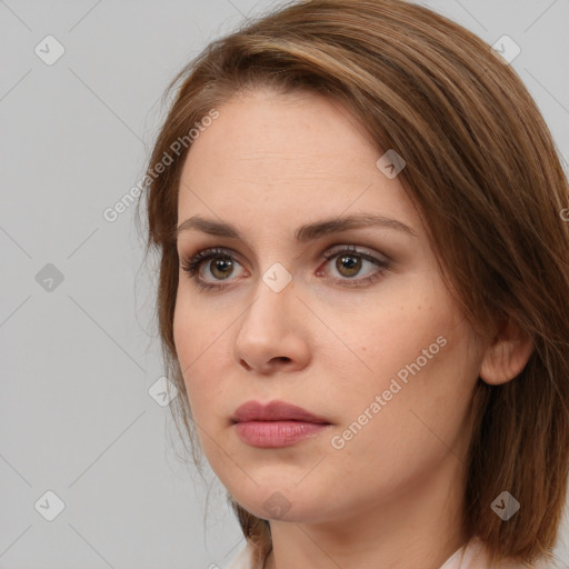 Neutral white young-adult female with medium  brown hair and brown eyes