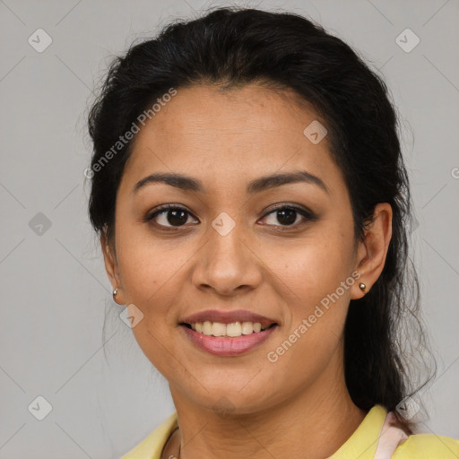 Joyful latino young-adult female with medium  brown hair and brown eyes