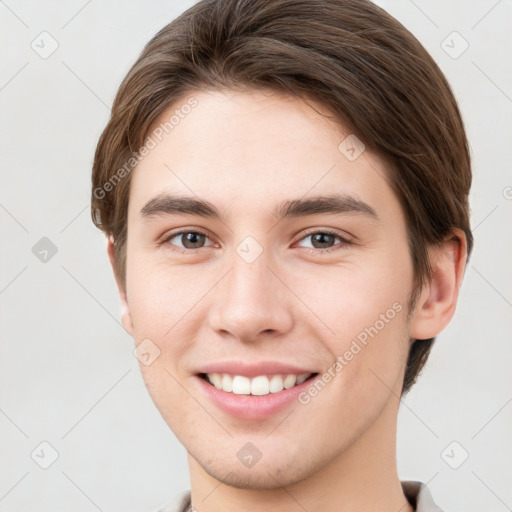 Joyful white young-adult female with short  brown hair and grey eyes