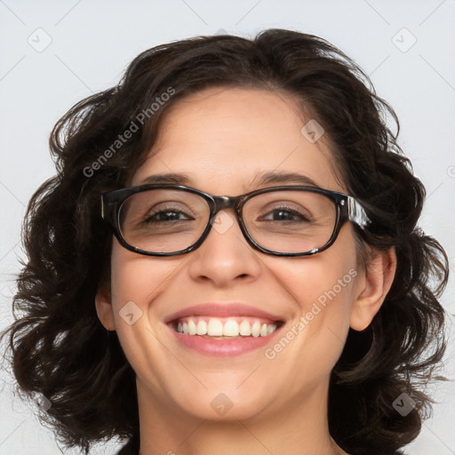 Joyful white adult female with medium  brown hair and blue eyes