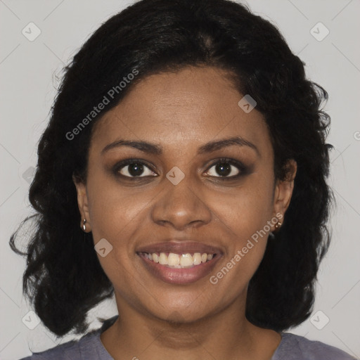 Joyful black young-adult female with medium  brown hair and brown eyes