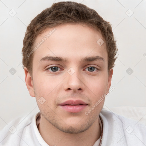 Neutral white young-adult male with short  brown hair and grey eyes