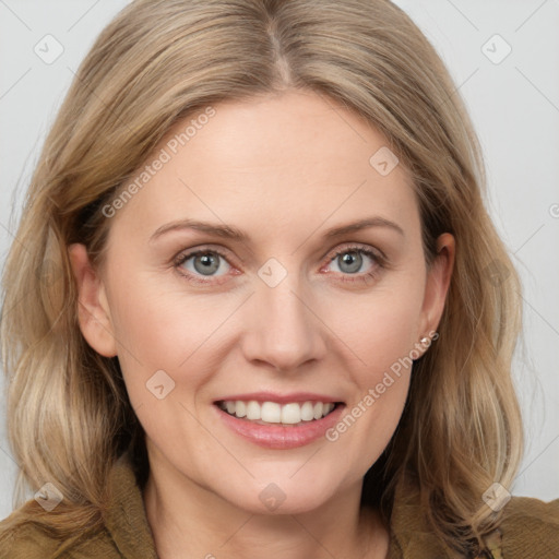 Joyful white young-adult female with long  brown hair and blue eyes