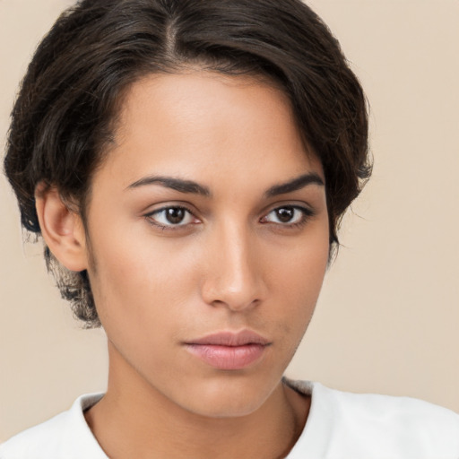 Neutral white young-adult female with short  brown hair and brown eyes