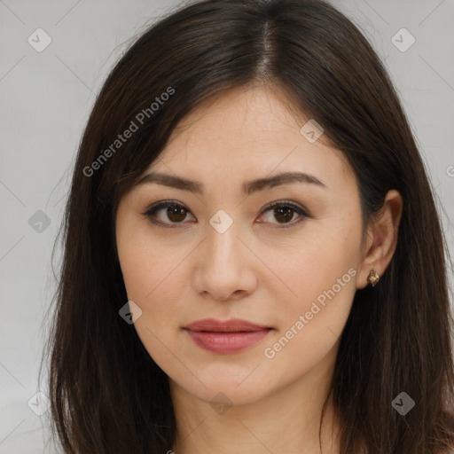 Joyful asian young-adult female with long  brown hair and brown eyes