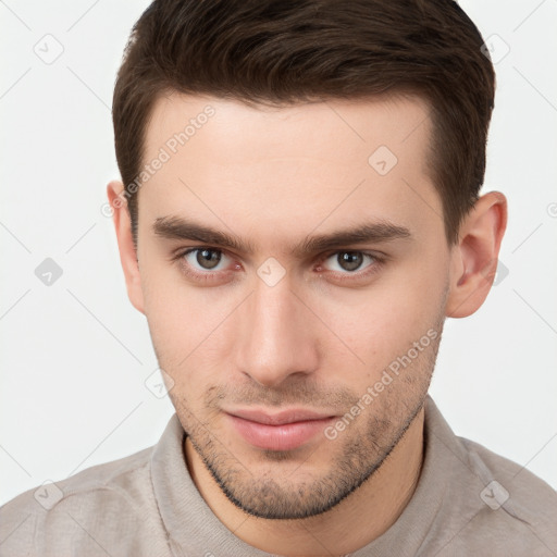 Neutral white young-adult male with short  brown hair and brown eyes