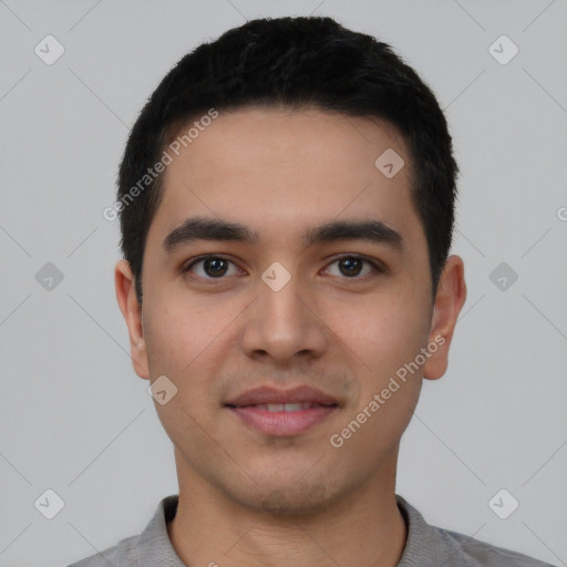 Joyful latino young-adult male with short  black hair and brown eyes