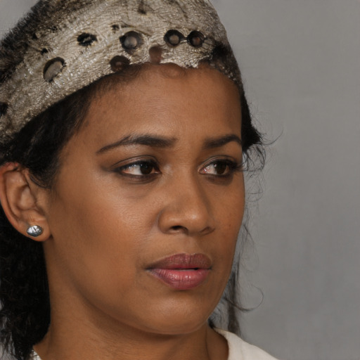 Neutral black young-adult female with short  brown hair and brown eyes
