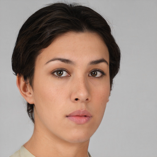 Neutral white young-adult female with short  brown hair and brown eyes