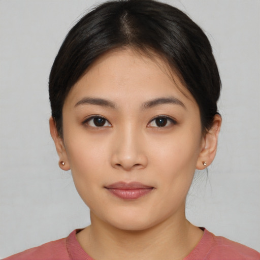 Neutral asian young-adult female with medium  black hair and brown eyes