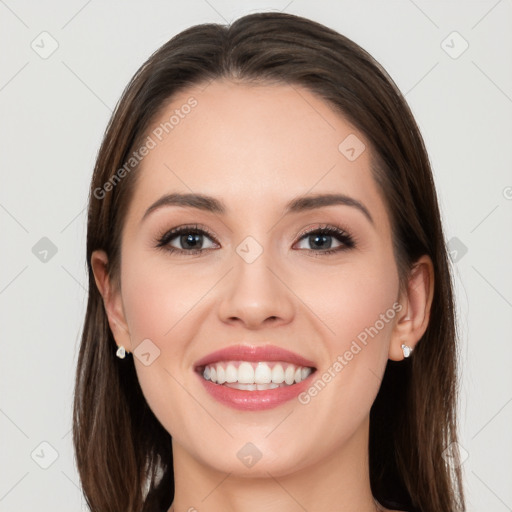 Joyful white young-adult female with long  brown hair and grey eyes