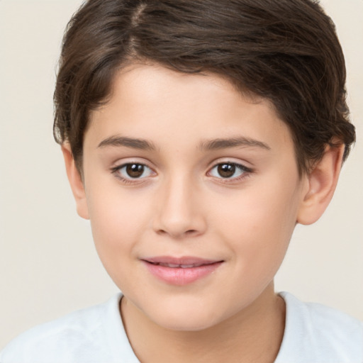 Joyful white child female with short  brown hair and brown eyes