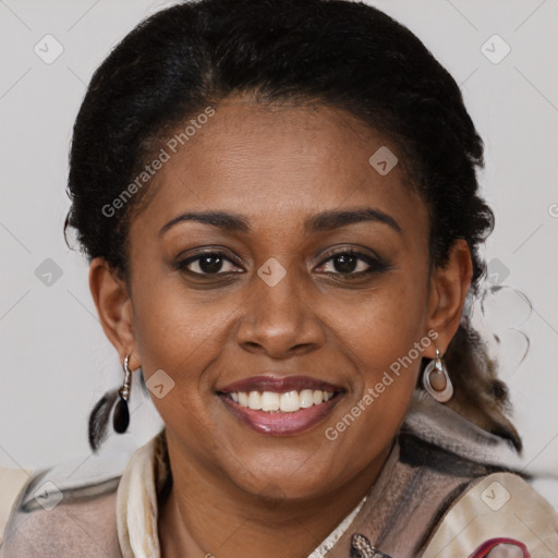 Joyful black young-adult female with medium  brown hair and brown eyes