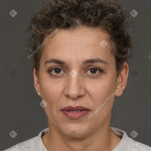 Joyful white adult female with short  brown hair and brown eyes