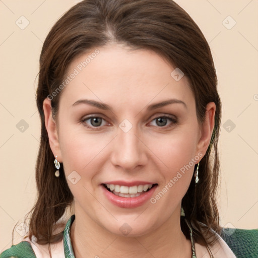 Joyful white young-adult female with medium  brown hair and green eyes