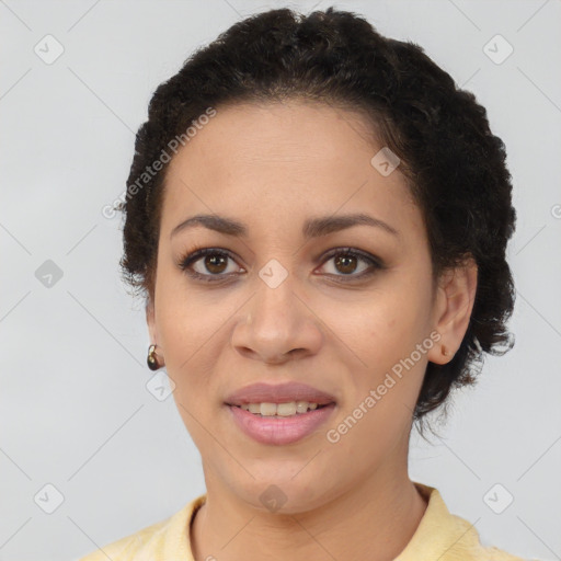 Joyful latino young-adult female with short  brown hair and brown eyes