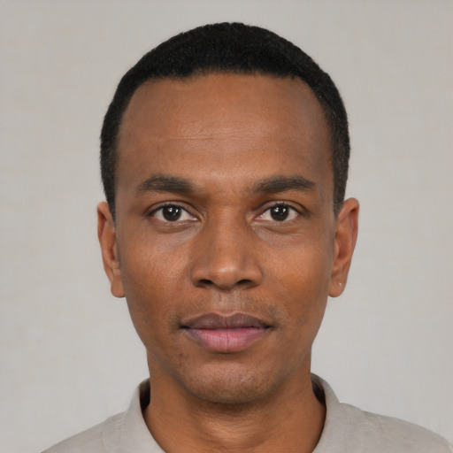 Neutral black young-adult male with short  black hair and brown eyes