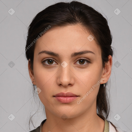 Neutral white young-adult female with medium  brown hair and brown eyes