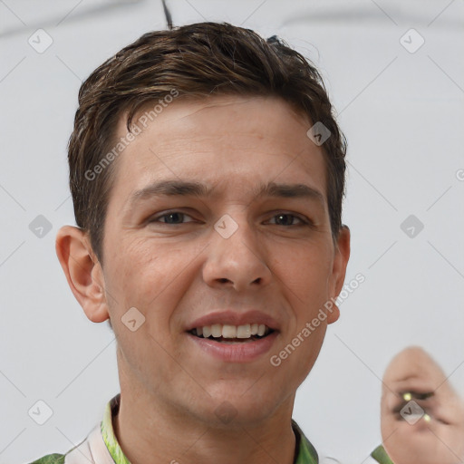 Joyful white young-adult male with short  brown hair and brown eyes