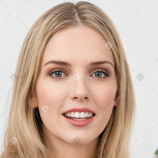 Joyful white young-adult female with long  brown hair and green eyes