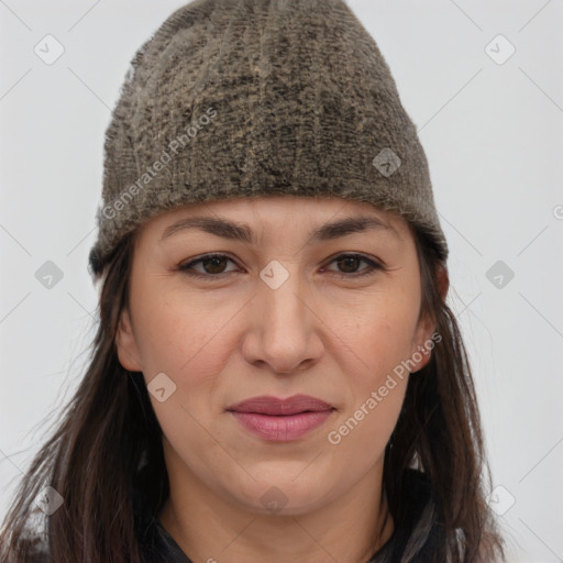 Joyful white young-adult female with long  brown hair and brown eyes