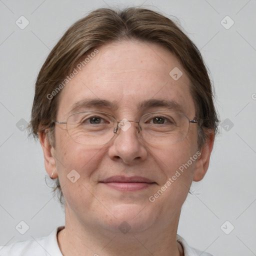 Joyful white adult female with short  brown hair and brown eyes