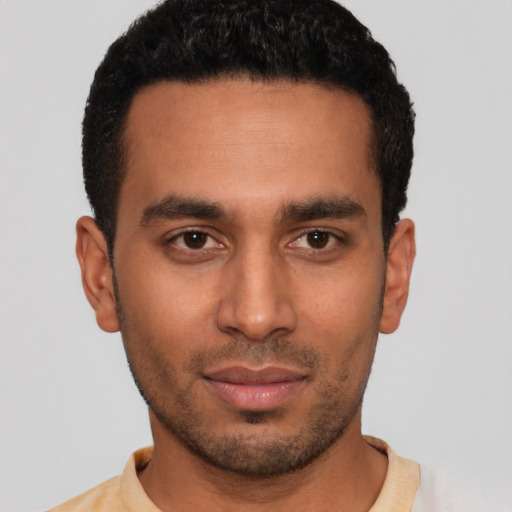 Neutral latino young-adult male with short  black hair and brown eyes