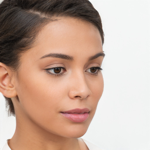 Neutral white young-adult female with medium  brown hair and brown eyes