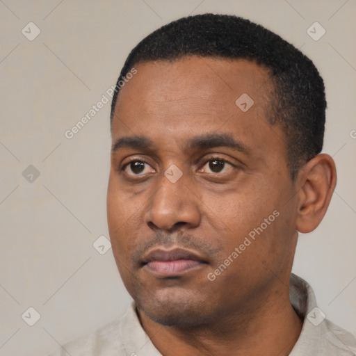 Neutral black young-adult male with short  black hair and brown eyes