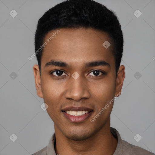 Joyful black young-adult male with short  black hair and brown eyes