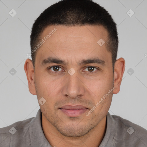 Joyful white young-adult male with short  brown hair and brown eyes