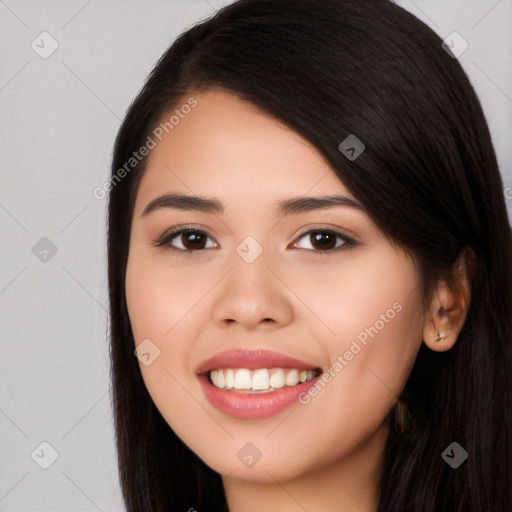 Joyful white young-adult female with long  black hair and brown eyes