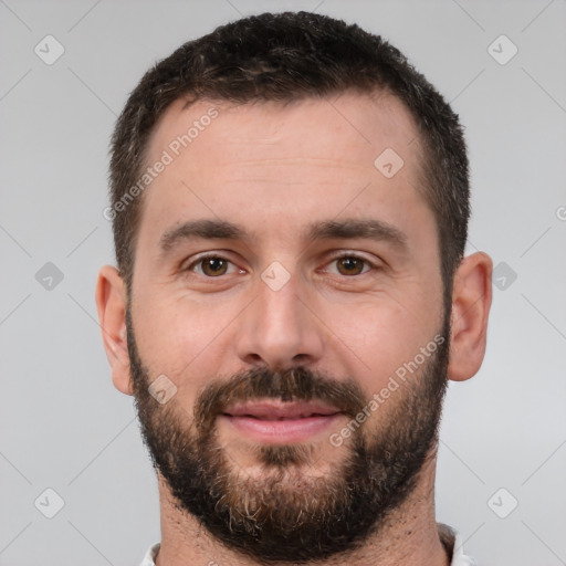 Joyful white young-adult male with short  brown hair and brown eyes