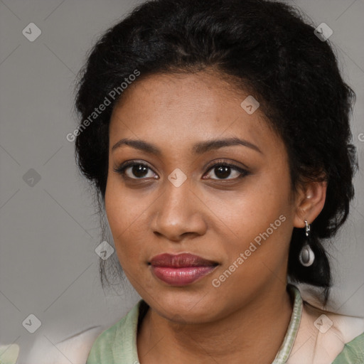 Joyful black young-adult female with medium  black hair and brown eyes