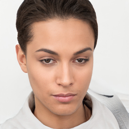 Neutral white young-adult female with short  brown hair and brown eyes