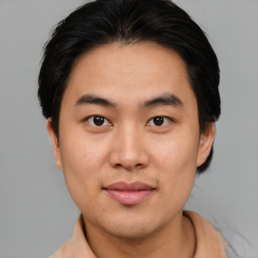 Neutral asian young-adult male with short  black hair and brown eyes
