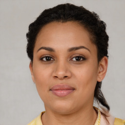 Joyful latino young-adult female with short  brown hair and brown eyes