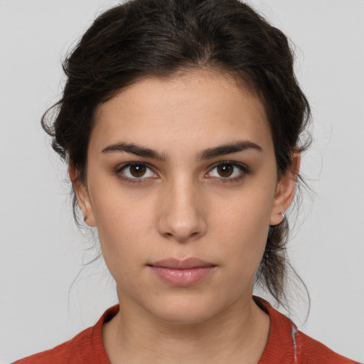 Neutral white young-adult female with medium  brown hair and brown eyes