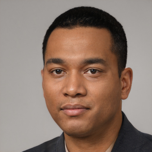 Neutral black young-adult male with short  black hair and brown eyes