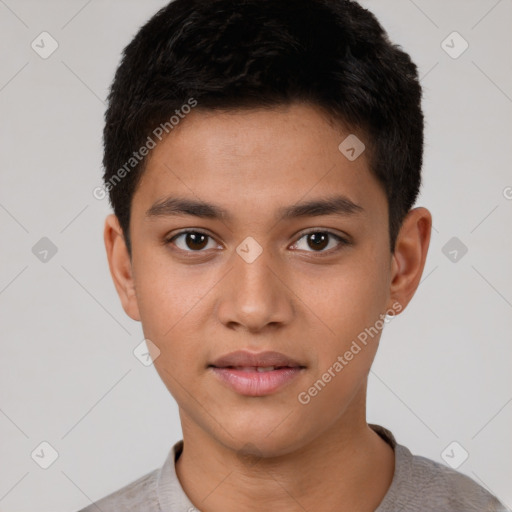 Joyful latino young-adult male with short  brown hair and brown eyes