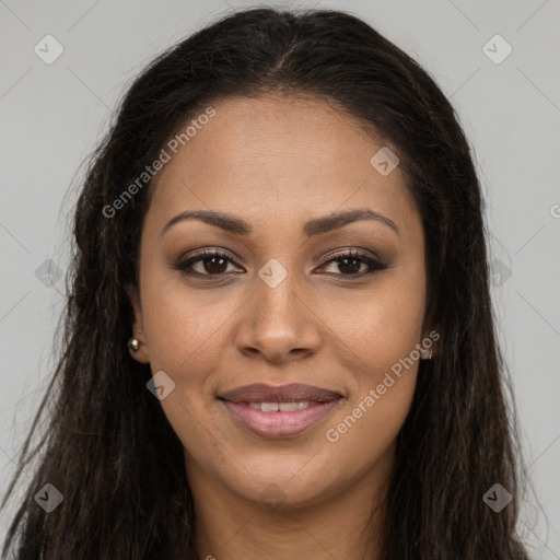 Joyful black young-adult female with long  brown hair and brown eyes