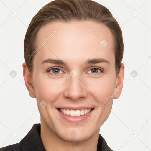 Joyful white young-adult female with short  brown hair and grey eyes