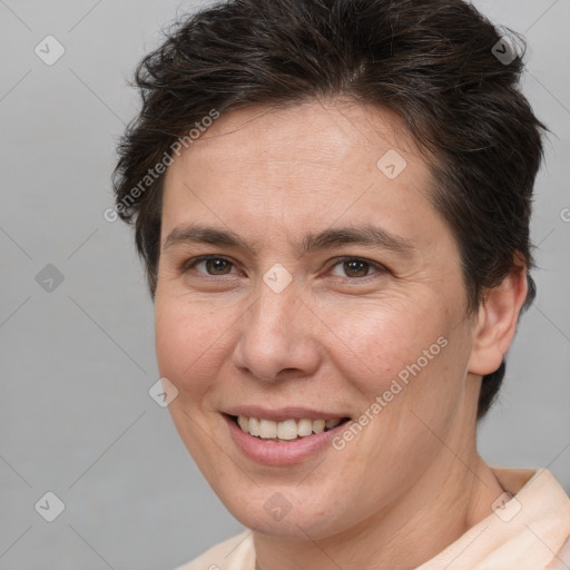 Joyful white adult female with short  brown hair and brown eyes