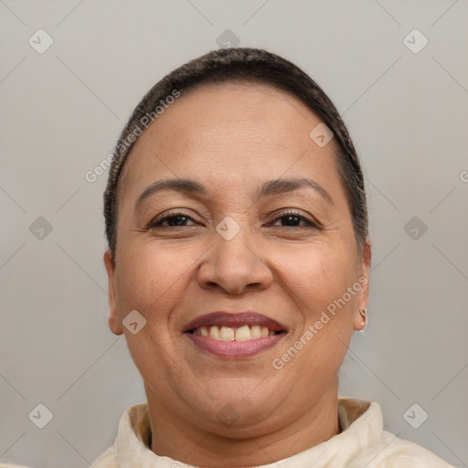 Joyful white adult female with short  brown hair and brown eyes