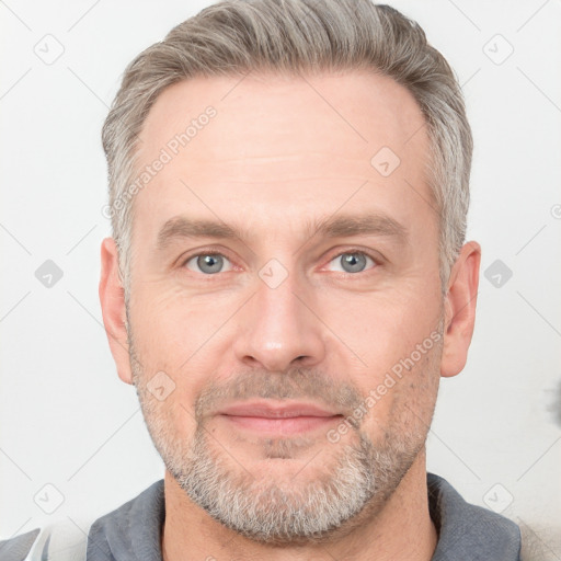 Neutral white adult male with short  brown hair and grey eyes