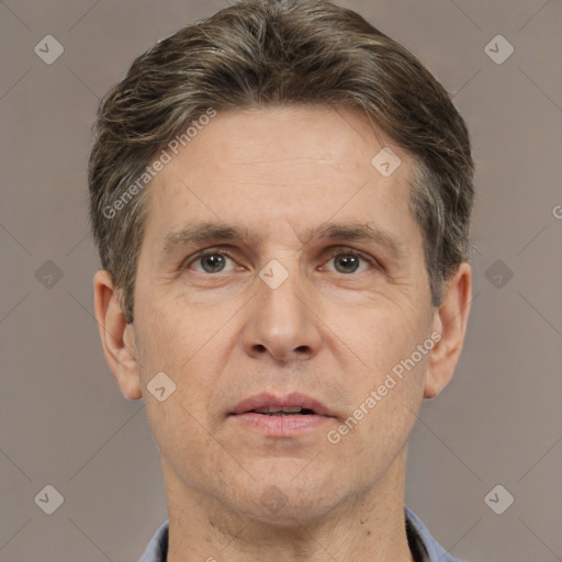 Neutral white adult male with short  brown hair and brown eyes