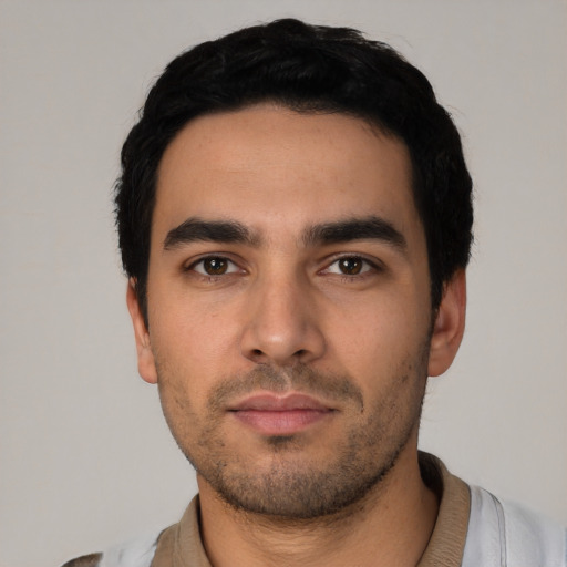 Neutral latino young-adult male with short  black hair and brown eyes