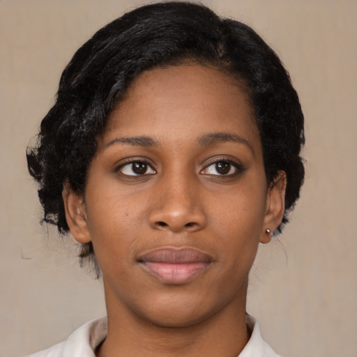 Neutral black young-adult female with short  black hair and brown eyes