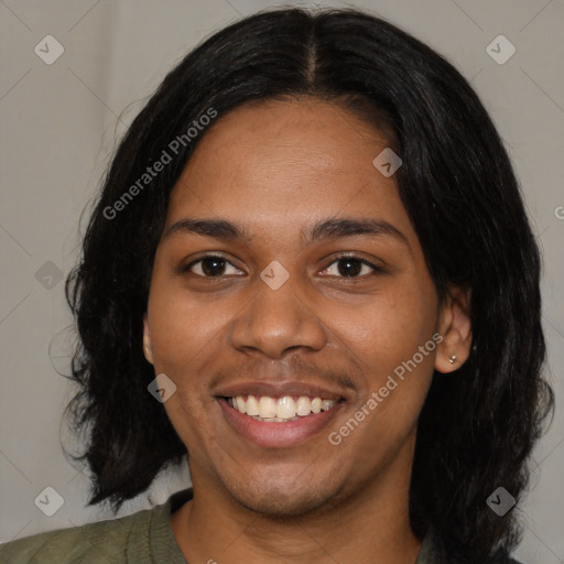 Joyful black young-adult female with medium  black hair and brown eyes