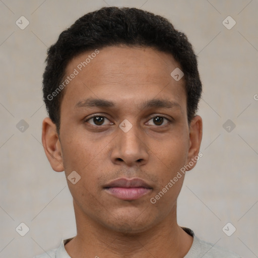 Neutral latino young-adult male with short  brown hair and brown eyes